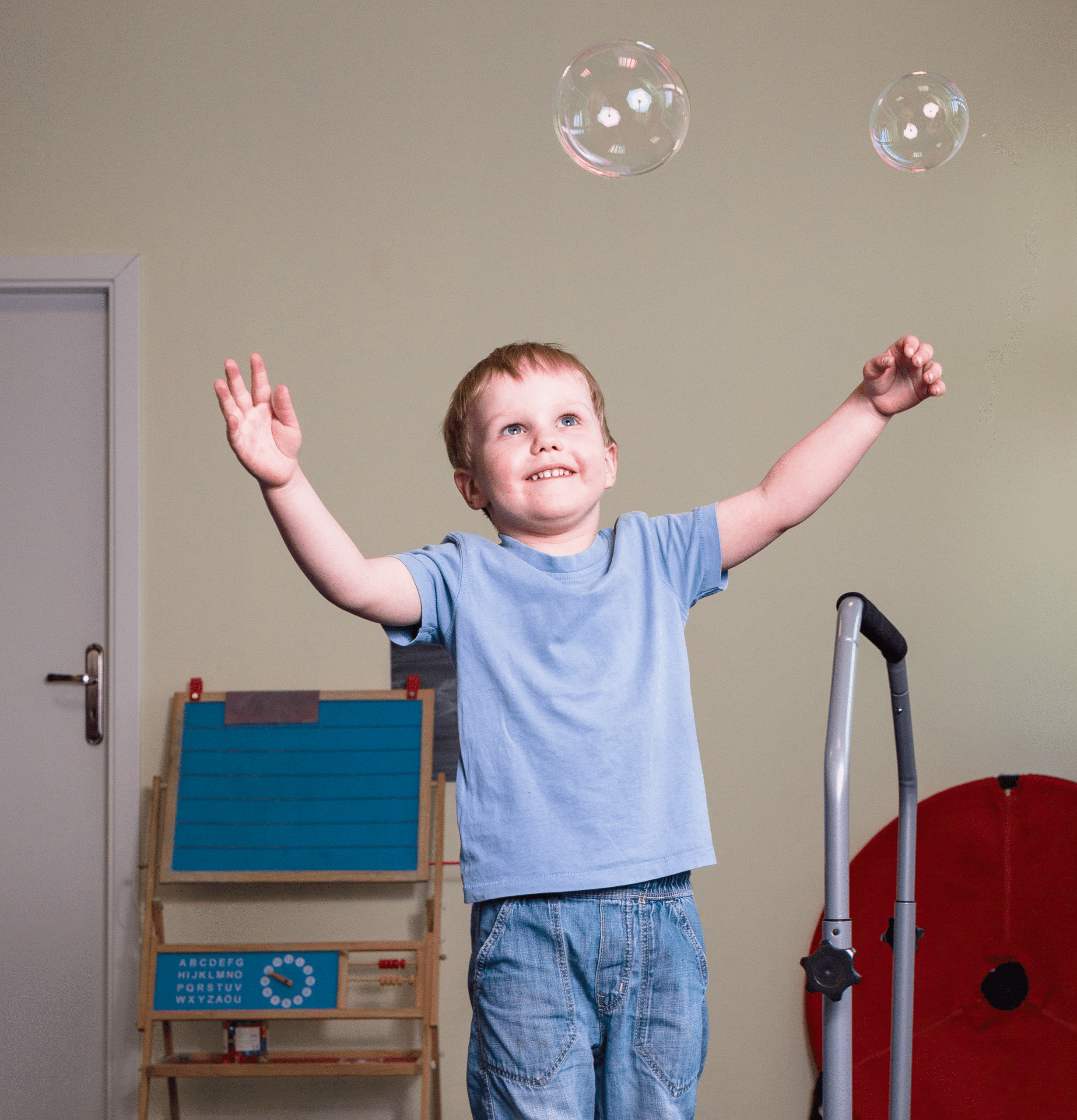 young boy with bubbles