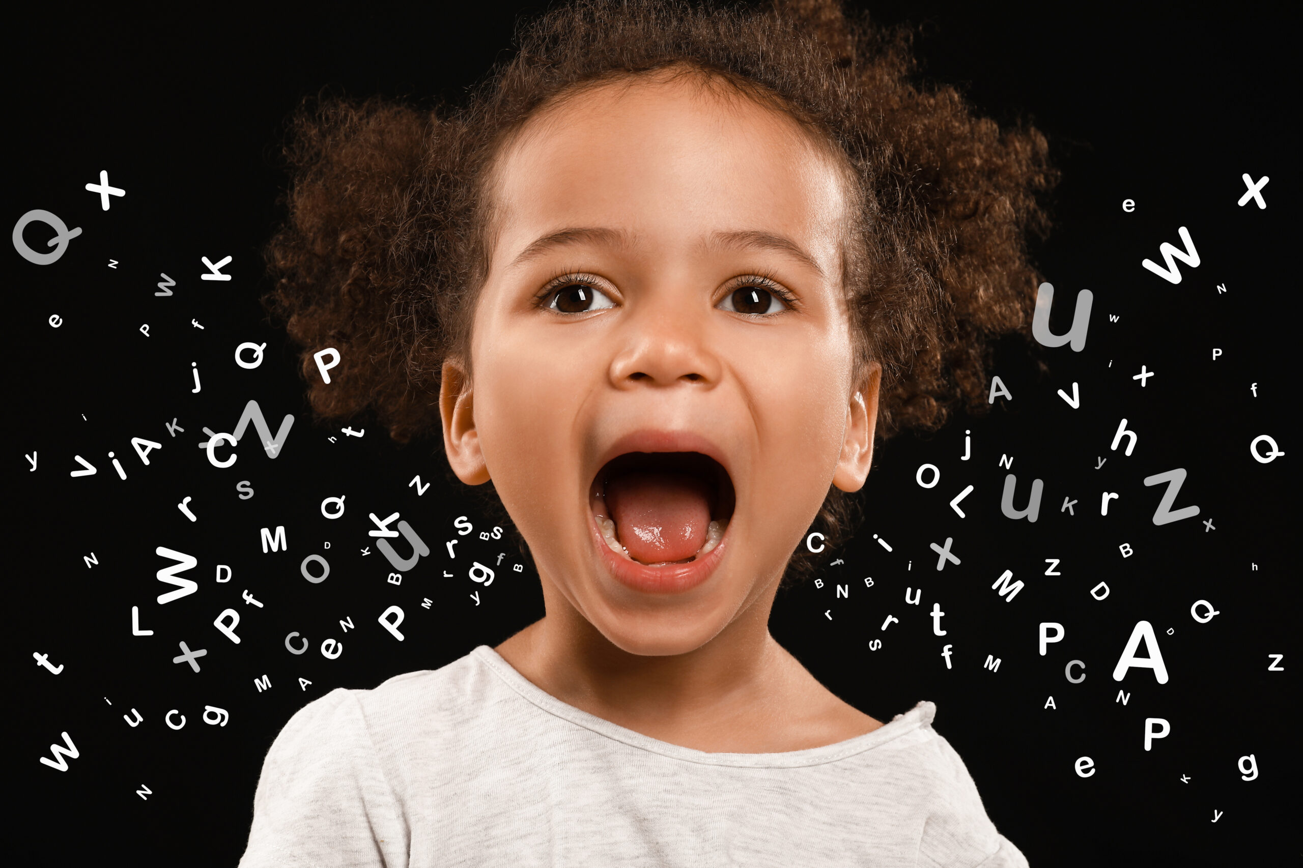 Screaming African-American girl with letters in background