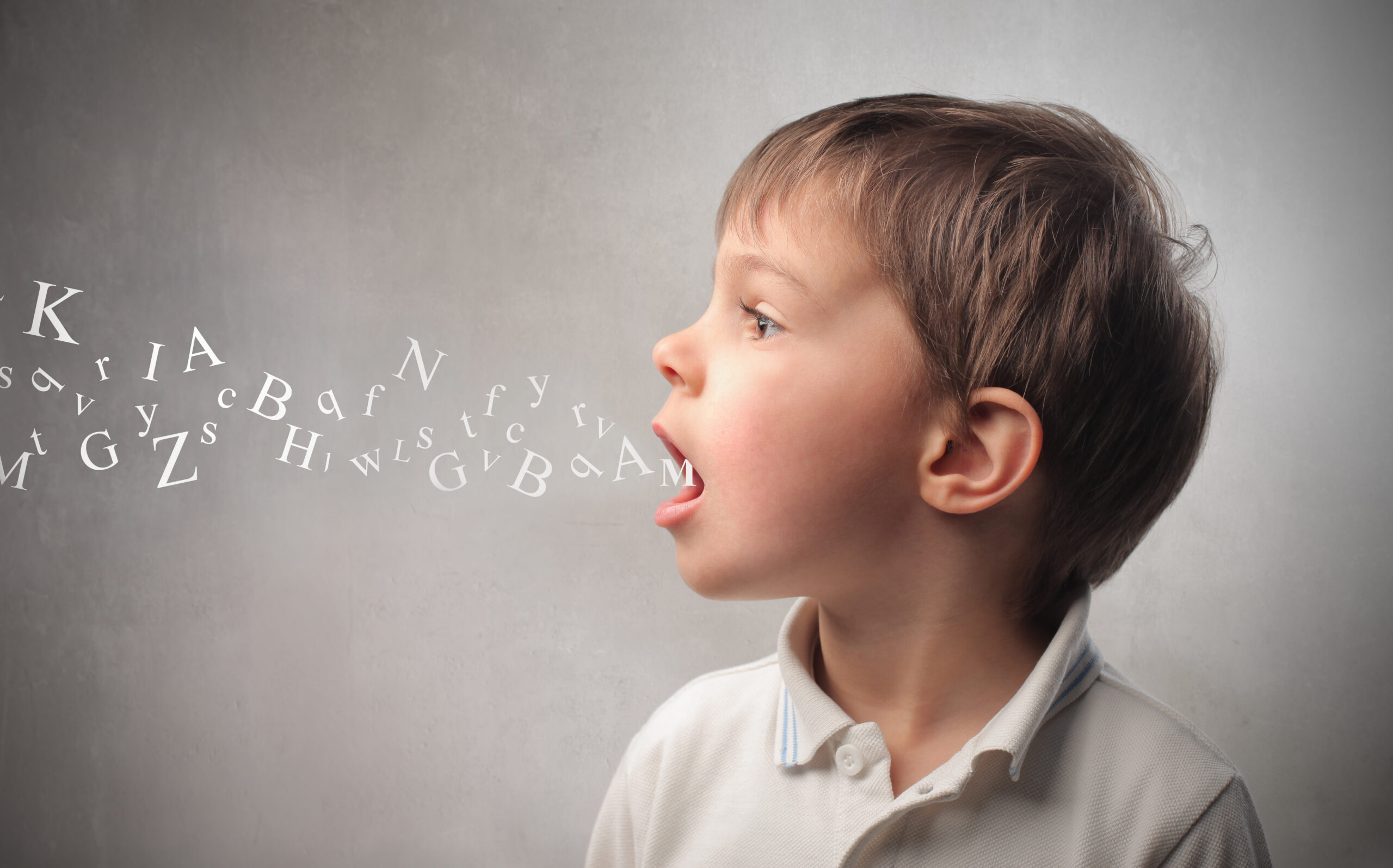 young boy speaking