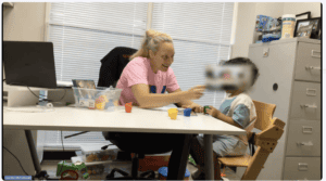 speech therapist with young patient