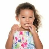 girl eating cracker girl eating a cracker